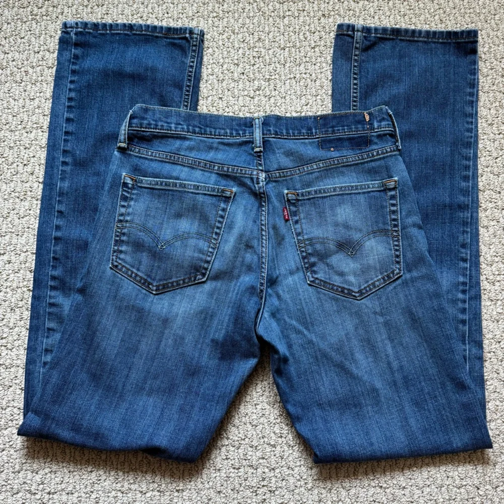 Levi's Distressed Blue Denim Straight Leg Red  Tag Jeans